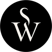 The StoryWicks circle mark, a cream S and W monogram on a black disc.